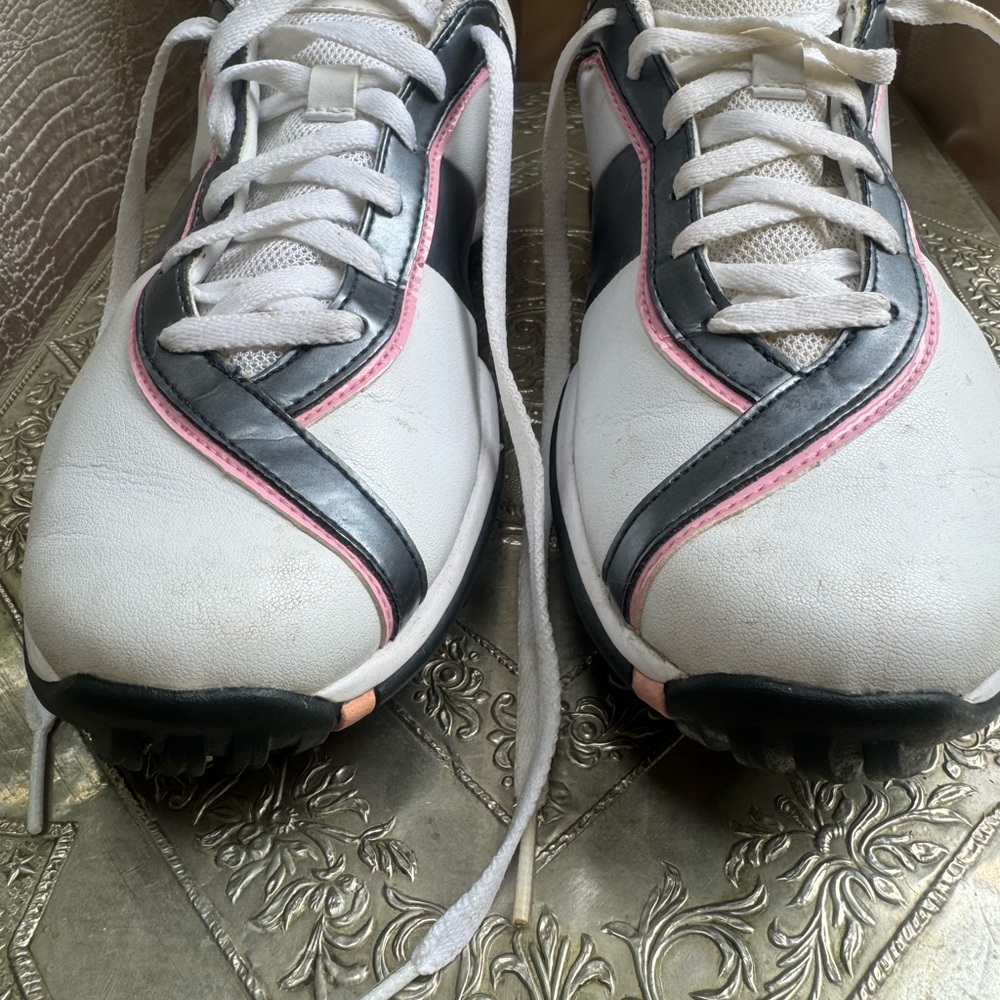 White and Pink Low-Top Sneakers with Sporty Design.